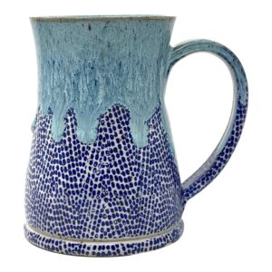 The Blues Mug features an indigo blue speckled chevron pattern drenched with a cool wash of aqua glaze.